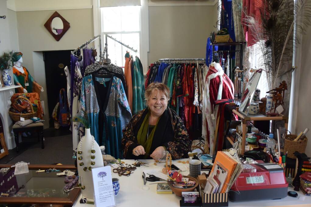 Follow your dreams: former school principal, Vana Ford, making jewellery in her boutique shop, Vasnas Designs, in one of Wauchope's most beautiful buildings.