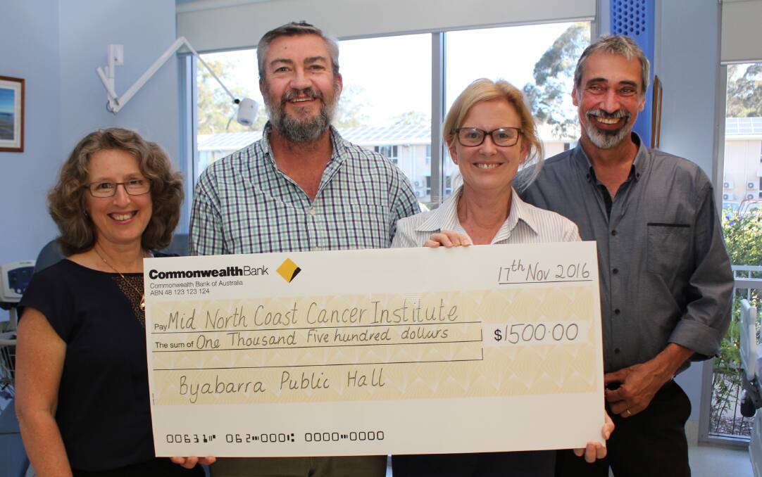 Bounty from Byabarra: Nursing unit manager Jenny Baroutis gratefully accepts a $1500 donation from Byabarra Community Hall trustees Cheryl and Brian Carpenter and Andrew Willows.