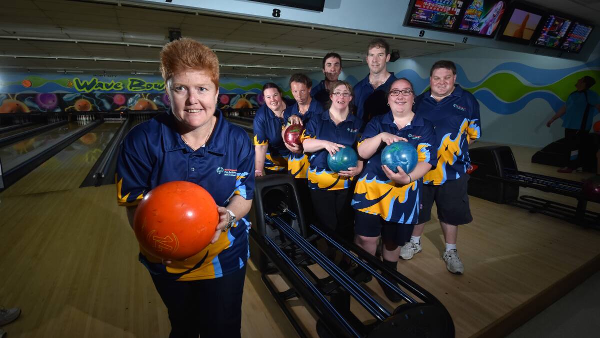 Going for gold: Renee Lewin, Haley Brown, Darren Wallis, Cameron Skinner, Kris Brown, Aaron Fox, Jennifer Davies, Vikki Thompson are off to Adelaide for the Special Olympics in April next year. Photo: Ivan Sajko