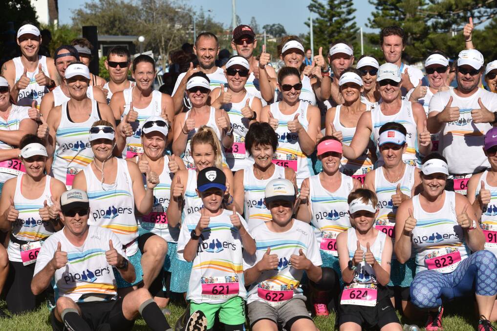 Thumbs up: Port Macquarie's Plodders won the largest team award at this year's Port Macquarie Running Festival with over 100 entrants. Photo: Ivan Sajko
