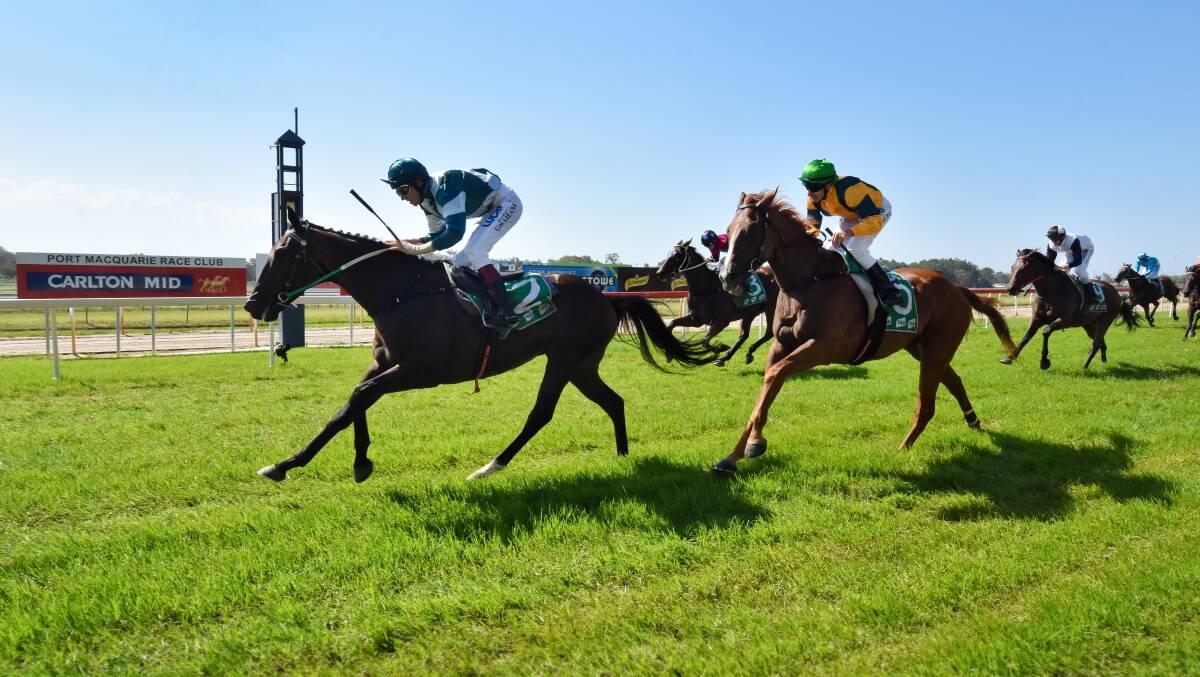 First past the post: Ride to Redemption with Peter Graham on board took out race three in Port Macquarie on Saturday. Photo: Ivan Sajko