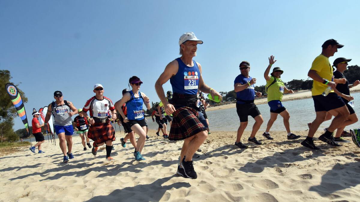 Hard work: Just under 400 competitors took on the challenging Beach to Brother marathon on Sunday. Photo: Ivan Sajko