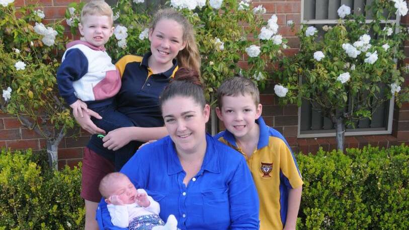 FAMILY: Shanelle Hyde with baby Paisley, nephew Xzavier Fraser, 2, and Kyrra and Malakye Hyde. Photo: JENNIFER HOAR
