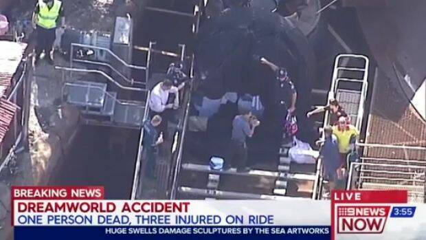 Emergency services workers and police at the scene of the incident at Dreamworld.  Photo: Nine News
