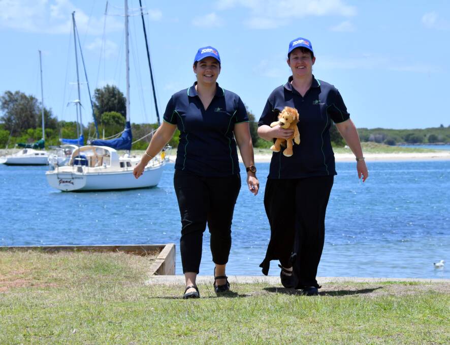WALKING: Dietitan Lucy Johnston and Diabetes educator Jodie Kennett with Lenny the lion. Photo: Ivan Sajko