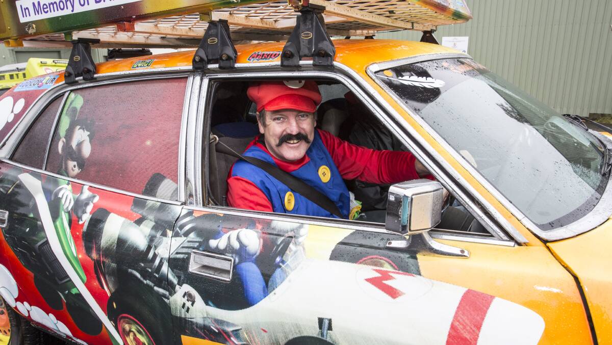 READY TO DRIVE: Marcus Hughes all dressed up for the 2016 car rally. Photo: Contributed
