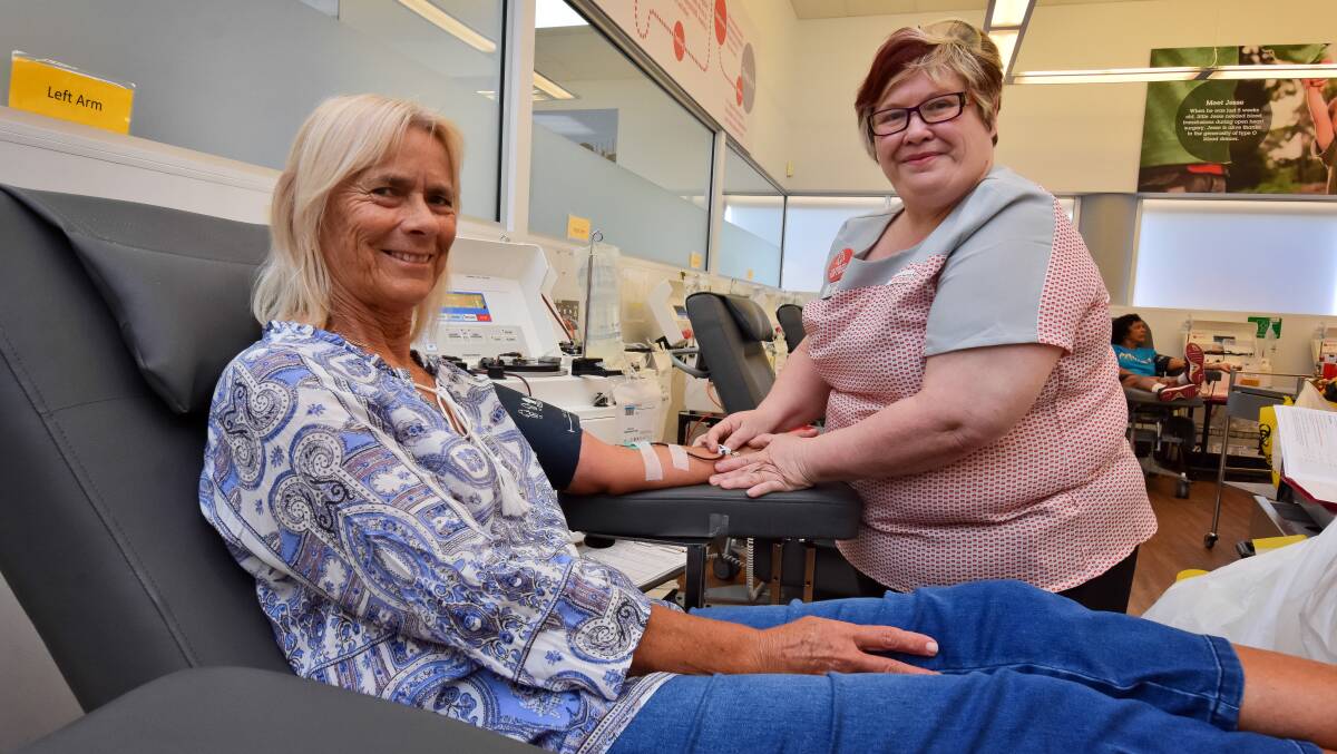 DONATION TIME: Di Bell with Port Macquarie Donor Center Manager Liz Matson on Tuesday. Photo: Ivan Sajko