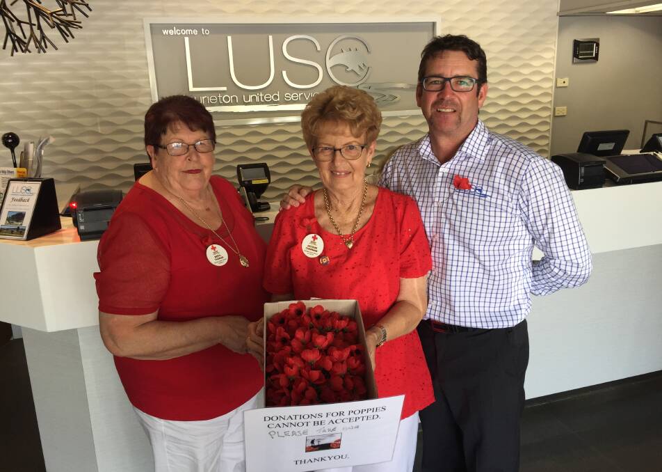 Poppies for free: People can collect a poppy from the Laurieton United Services Club.