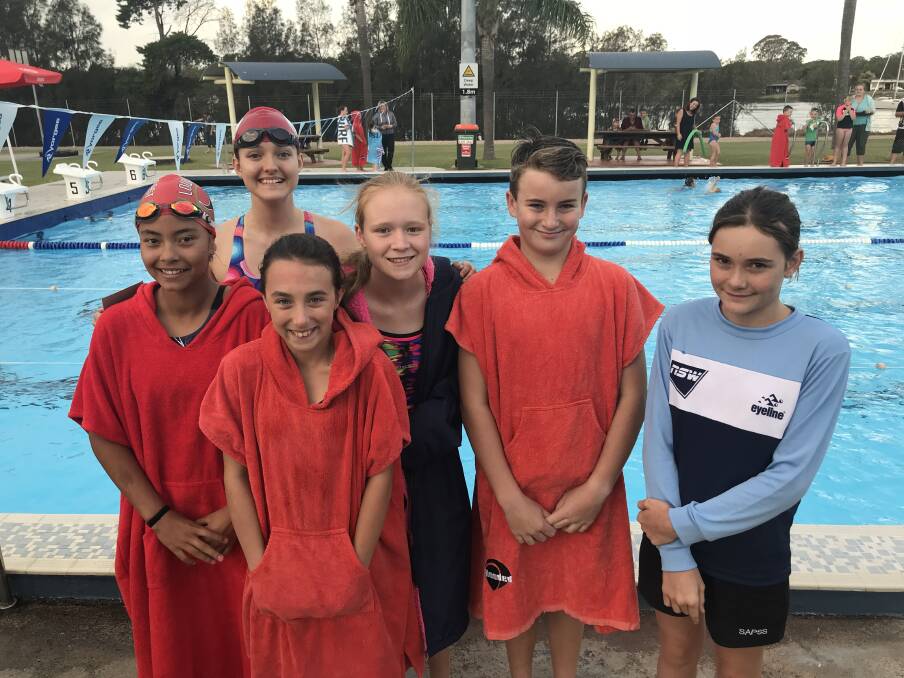 Excellence: Vanna Limeburner, Tiarna Huckel, Madelaine Goodridge, Bailey Whitton and Sarah McIntosh were recognised for their swimming achievements at Laurieton pool as swimming club season kicked off. Absent: Hugh Rackleyand Emma Wheeler.