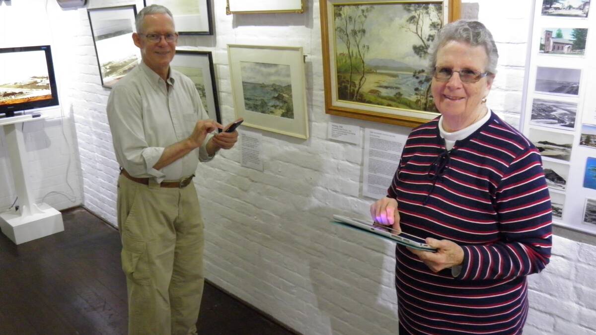 Clive Smith and Lil Andrews give the Port Macquarie Museum’s free Wi-Fi one last test before it is launched on World Tourism Day. The museum is celebrating the day with free entry. 