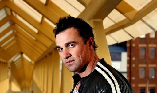 Fired up: Shannon Noll hits back at "stupidly dangerous" act after a firecracker was thrown on stage at his gig in South West Rocks. 