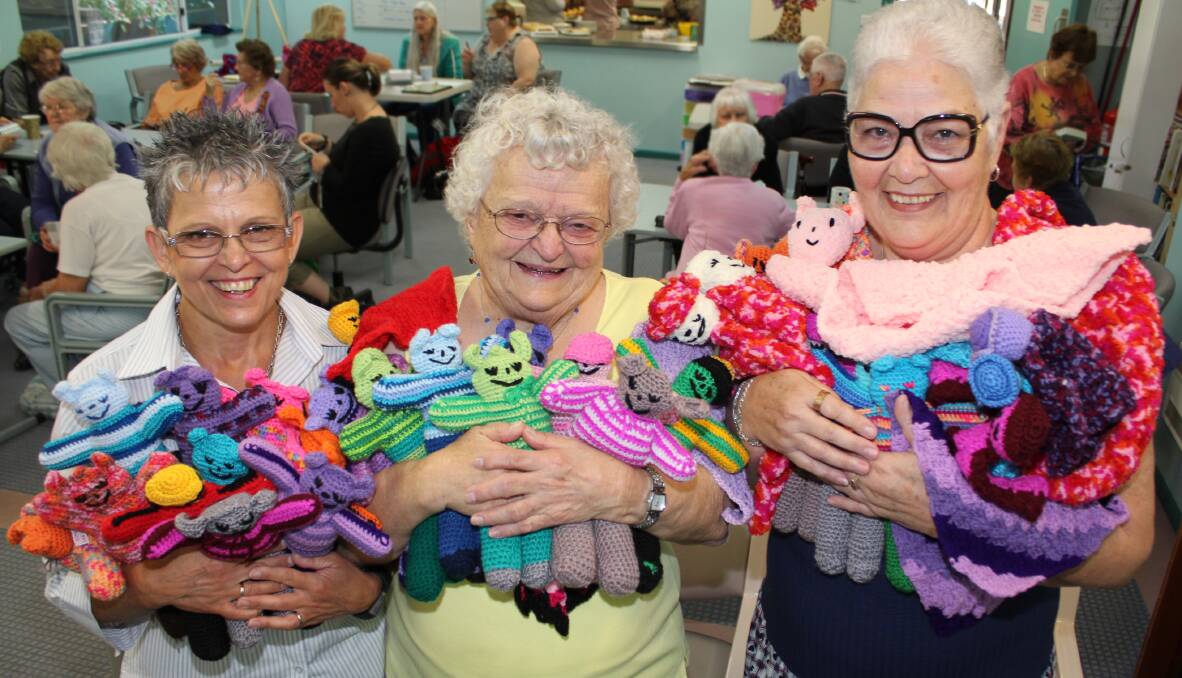 North Haven resident Rachael Spurway was honoured for her work making trauma teddies for paediatric patients at Port Macquarie Base Hospital. Pictured with Rachael at the Camden Haven Auxiliary’s meeting on Monday are Paediatric Nursing Unit Manager Cheryl Nolte and the United Hospital Auxiliary’s North Eastern Zone Representative Phillipa Passfield.