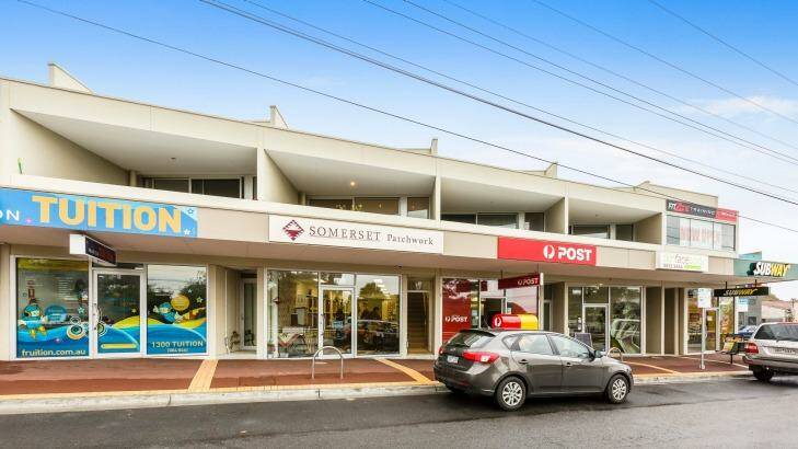 The combination of five ground level shops, four upstairs apartments and rooftop commercial premises in a near-new two-storey building at 580-584 Canterbury Road in Vermont prompted an investor to pay $5.9 million for the complex. Photo: LEE SANDERS