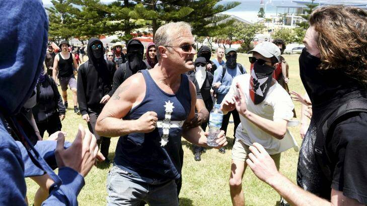 Opposing groups clash at the 10th anniversary of the Cronulla race riots. Photo: James Brickwood