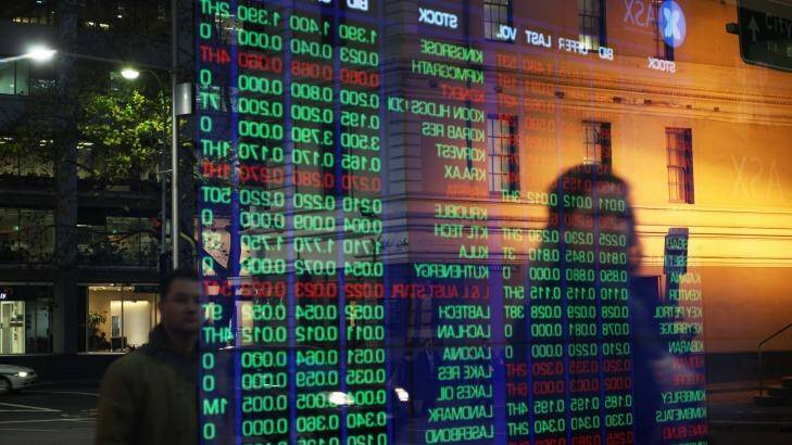 Earnings per share on the ASX 200 will rise for the first time in three years, analysts predict. Photo: Peter Braig