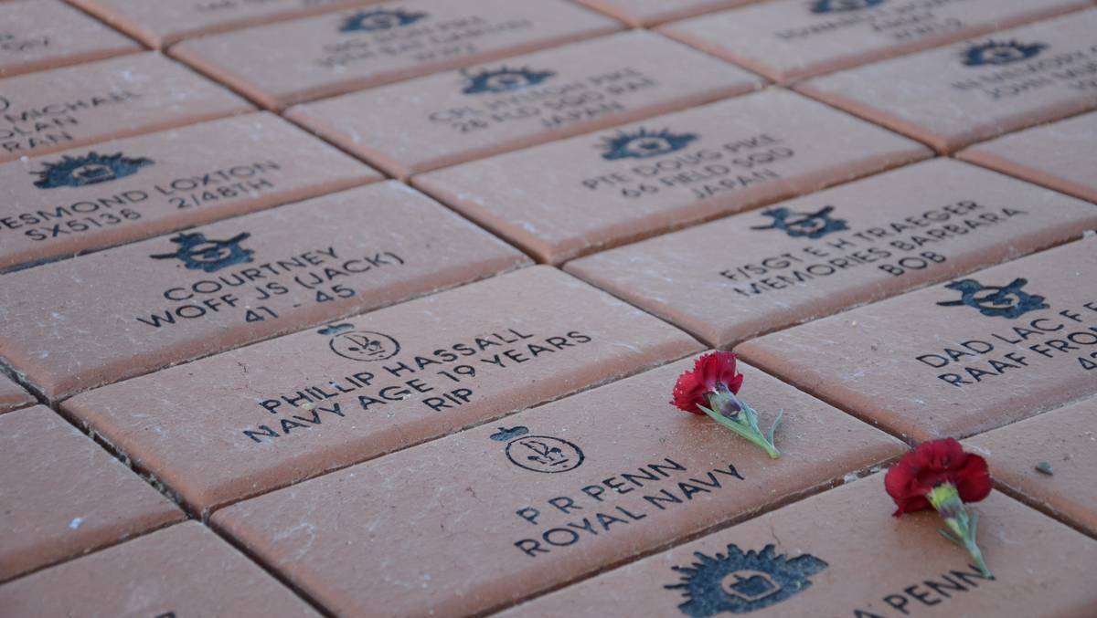 MURRAY BRIDGE: Poppies lie on the memorial pavers at Murray Bridge RSL on Anzac Day. Photo: The Murray Valley Standard. 