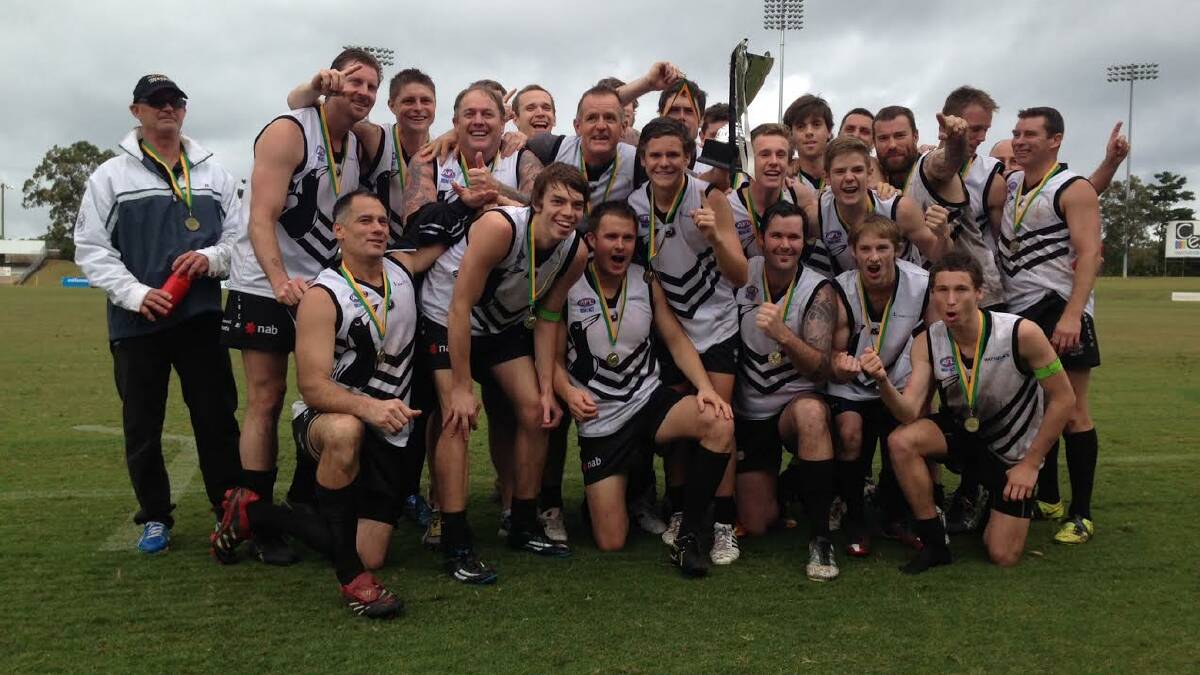 That winning feeling: The successful reserve grade side celebrating their big win.