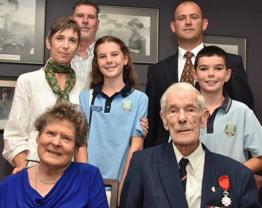 Proud relations: Graham Otley's family was on hand for his special occasion on Thursday. They were, back from left, Peter O'Brien and Richard Otley, middle, Margaret, Jasmine and Charlie O'Brien and, front, Joan and Graham Otley. Photo: IVAN SAJKO