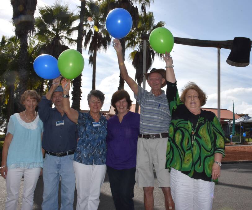 Celebrations: iKew volunteers Cynthia Smith, Jim Paynter, Faith Bell, Diane Hayes, Jack Glover and Cecile Monteith celebrate the centres third anniversary.