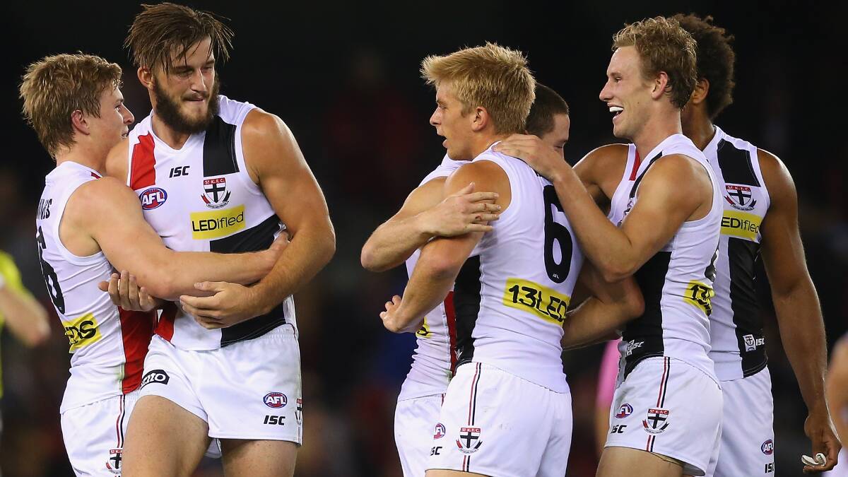Saints players celebrates winning the round five AFL match between the Essendon Bombers and the St Kilda Saints at Etihad Stadium on April 19, 2014 in Melbourne, Australia. Photo: Quinn Rooney/Getty Images.