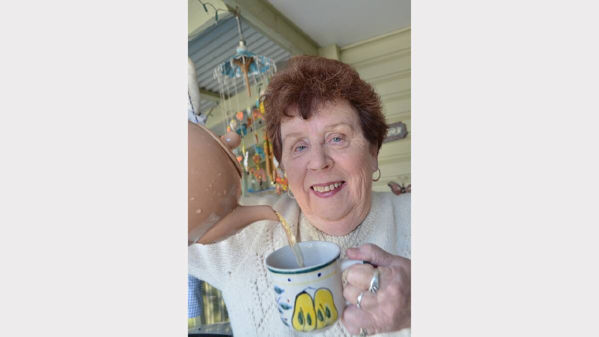 Cash cow win: Single aged pensioner Barbara Sentance celebrates with a cuppa after winning $20,000 from Network Seven morning show Sunrise on Monday.