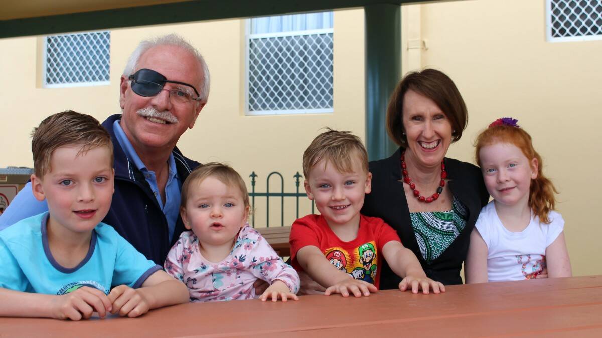 SIGNIFICANT ROLE: Bailey, Harper, Tobias and Lily Rowlatt, with their grandfather Ian
Newton and Member for Port Macquarie Leslie Williams.