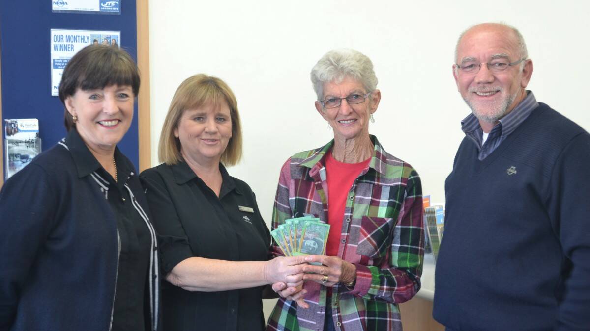 From left, NRMA staff members Linda Whittingham and Jen Nix, with Margaret Cross, who won $500, and proprietor Terry Green.