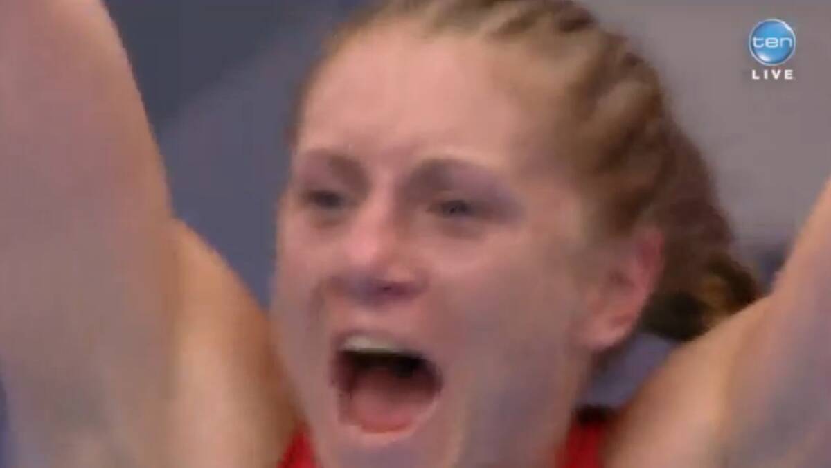A quick screenshot of Shelley Watts' arm raised in victory after her first fight at the Commonwealth Games.