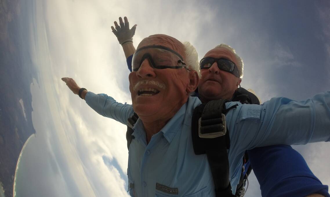 FLYING HIGH: Ray Elliott and sky diving instructor Tony Maurer from Coastal Sky Divers free fall from 10,000 feet above Port Macquarie.