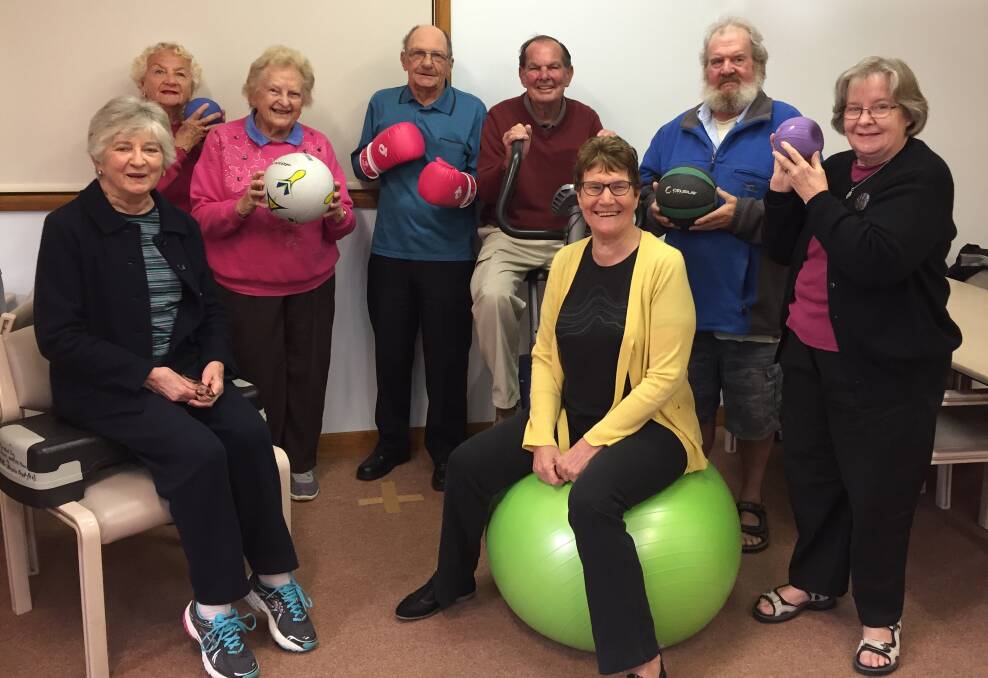 WORKING OUT: Loretta Myers, Judy Vipond, Gwen Nelson, David Coffee, Laurence Russ, Kay Twomey, Dennis Douglas and Cheryl Barid loving their respiratory exercise program at the Camden Haven Community Health Centre in Laurieton.