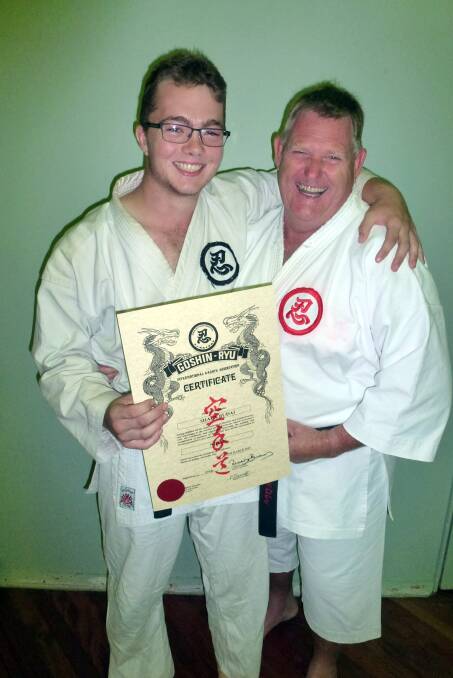 GREAT ACHIEVEMENT: Shaun Budai with instructor Peter Becroft.