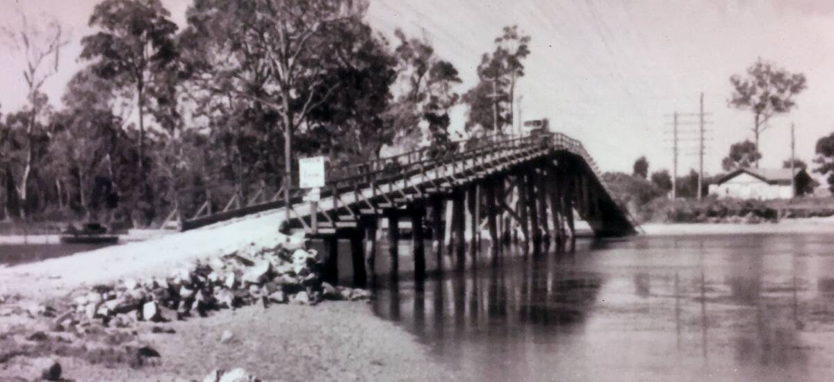 The first Stingray Creek Bridge, 1930s: The new bridge is on the same area as the old "humpty-back". Photo: Camden Haven Historical Society.