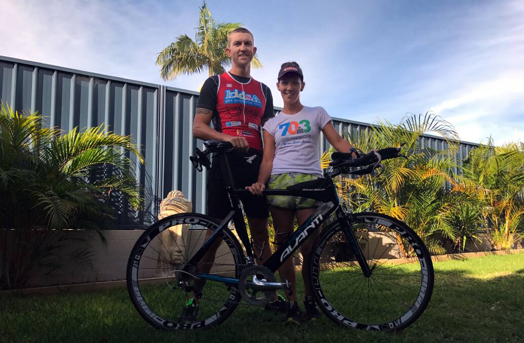 RAISING AWARENESS THROUGH IRONMAN: Adrian and Cassie Pensini will take on the Port Macquarie Ironman 70.3 on Sunday.