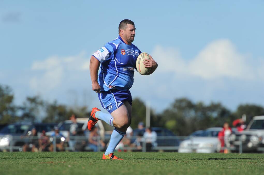 POWERHOUSE: Robert 'Smokey' Smith in action during his 100th game for the Kendall Blues. Photo: Ivan Sajko