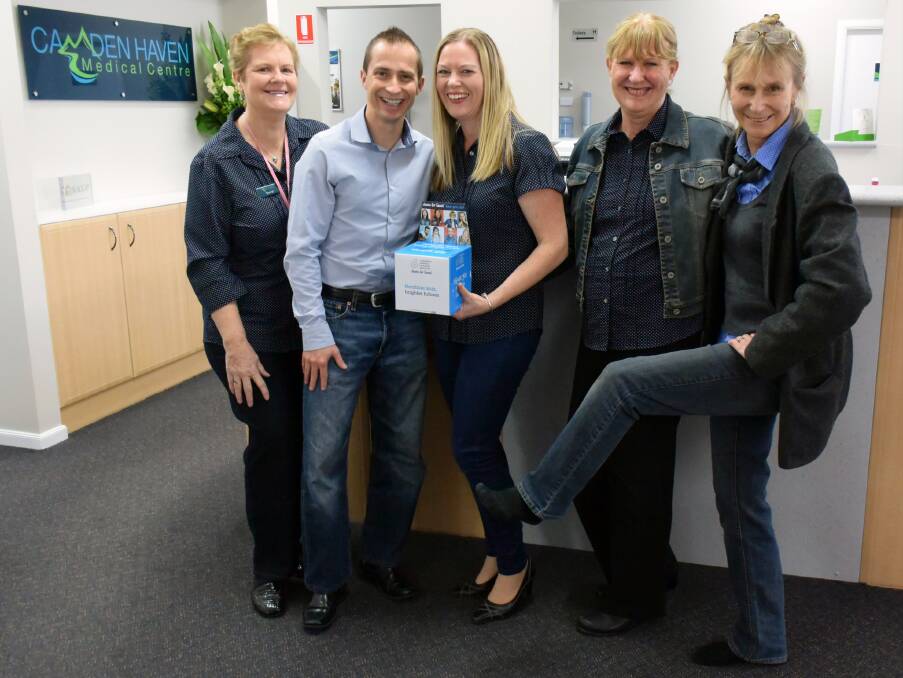 THEY'VE PUT THEIR BLUE JEANS ON: Jeans for Genes Day is the perfect excuse for dressing casual on Friday August 5 and the team at Camden Haven Medical Centre is collecting donations for the cause. Pictured from left are Sheryl Gardiner, Dr Phil Gaut, Caroline Gaut, Jenny Hancox and Katie Royds.