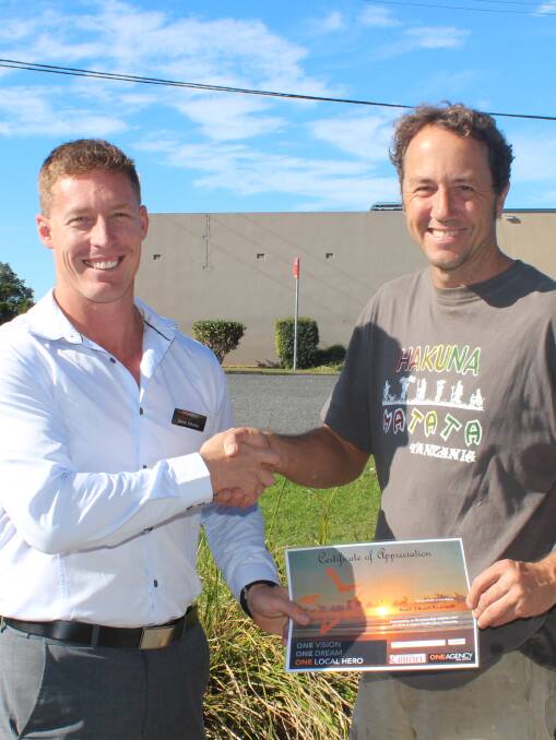 WELL DONE: Gaven Whalley from ONE Agency with Andy McCoubrie from Beach to Beach Riverwalk project.