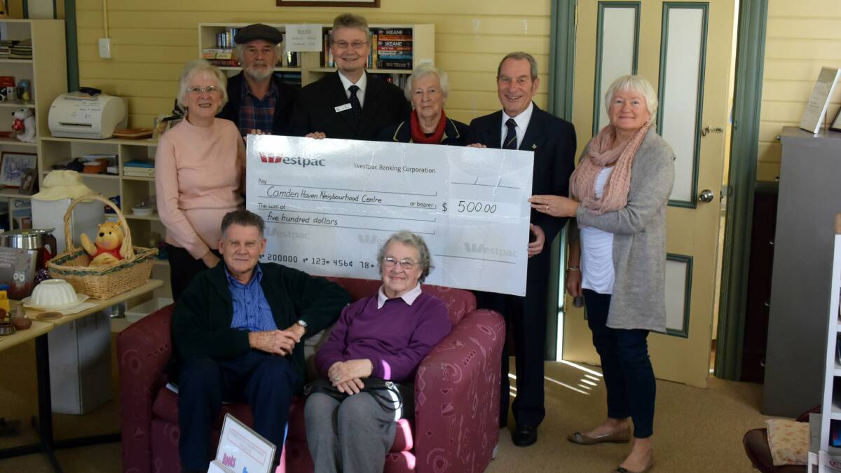 GENEROSITY SHARED: Laurieton Freemasons presented a cheque for $500 to the Laurieton Neighbourhood centre on Wednesday. Pictured in the top row from left are Joyce O'Neill, Chris Denne, Tony Spouse, Win Carpenter, Walter Schellenberg and Julie Daniell. Seated are Colin and Bev Flood.