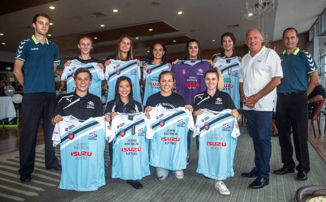 Women's first grade High Performance team with Mike Parsons from sponsors John Patrick Isuzu Ute.