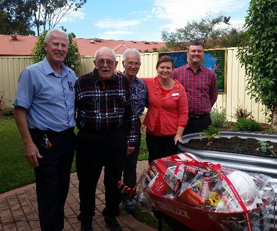 DIY MEN'S SHED: Residents and staff with the men's shed donation – Ross Gardiner, Richard and Troy, with Deputy Director Care Services Dale Feeney.