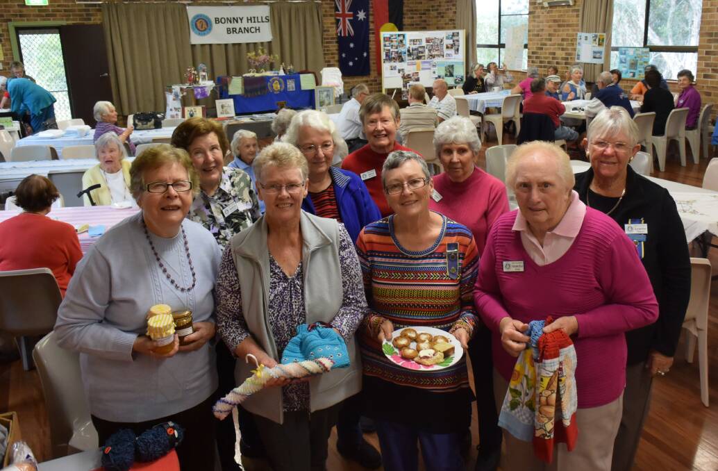 MANY HANDS SUPPORTING THE COMMUNITY: Some of the funding and long-serving members of the Bonny Hills CWA. Carmel Rees, Lorraine Winner, Jennifer Smith, Annette Jepp, Robyn Clancy, Anneke Eygenraam, Joyce Wulff, June Lees and Lyn Allport.