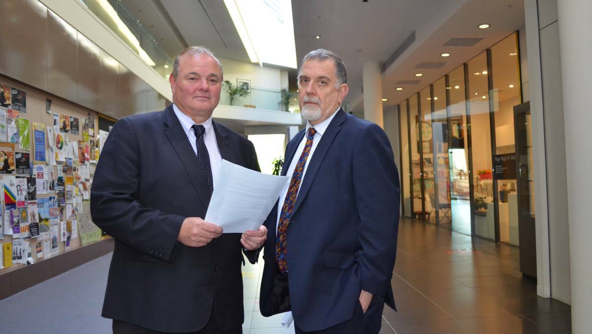 SHOCK REPORT: Alan Eldridge (left) and Brian Williamson after revealing unlawful planning decisions made by Wagga City Council. Picture: Ken Grimson