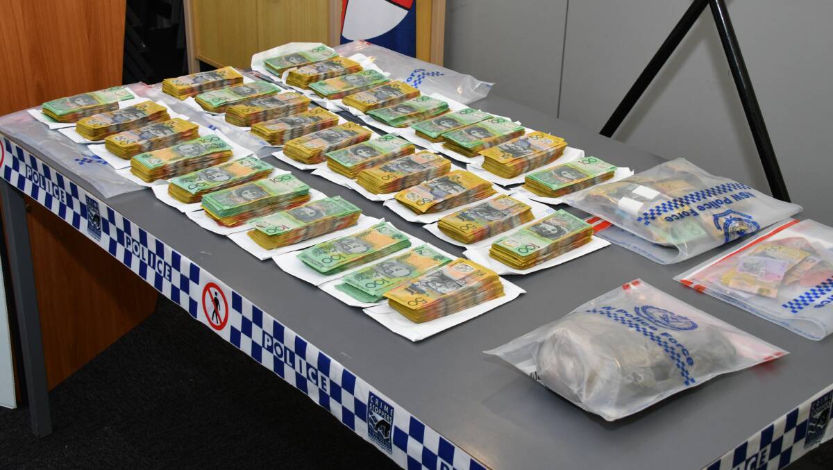 A lot of dough: Some of the hundreds of thousands of dollars in cash seized by police on November 1, 2017. Photo: Matt Attard