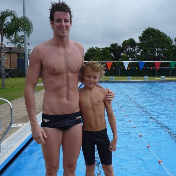 Young Jaivan Brown meets his swimming hero James Magnussen at Laurieton Swimming Pool last December