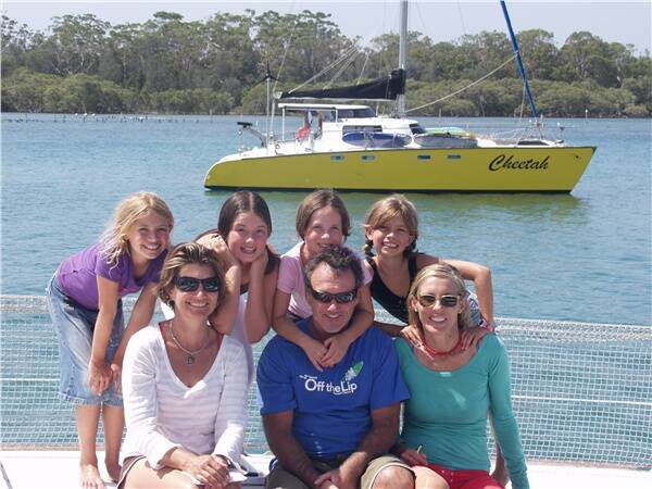 Happy families: Front row (L to R): Sharon Schofield, Lewis Perry, Kate Perry. Back row: Samantha Schofield, Dolores Perry, Daphne Perry and Jacinta Schofield on their east coast ocean adventure .