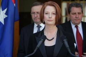 Prime Minister Julia Gillard comments on the grounding of Qantas flights during a news conference with Transport Minister Anthony Albanese (left) and Workplace Relations Minister Senator Chris Evans (right) at Parliament House Canberra. Photo: Alex Ellinghausen