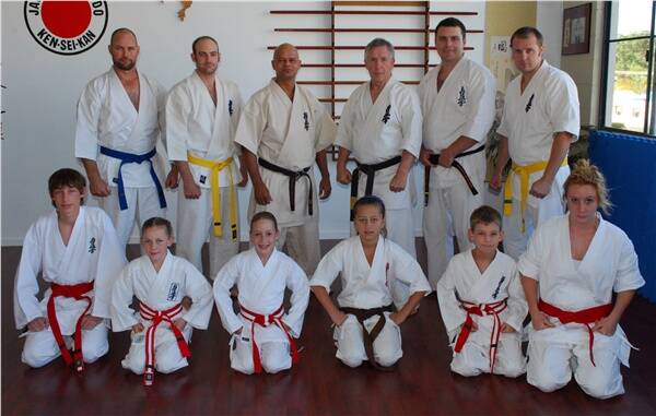 Members of the Port Macquarie Kyokushin Karate Club were honoured to welcome Hanshi John Taylor to their training recently. Rear row right to left Phil Coulton, Dave Reid, Mark Tyson, John Taylor, David Hearne, Steven Lee. Front row right to left; Jaydon Coulton, Tahlia Coulton,Molly Fraser, Tyson, Lucas Coulton, Emily Fraser.