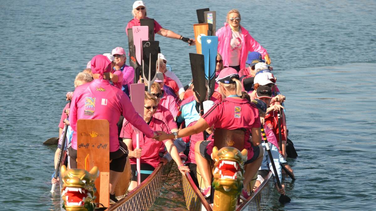 Camden Haven Dragon Boat Regatta. Tribute to thos who have lost their battle with breast cancer.