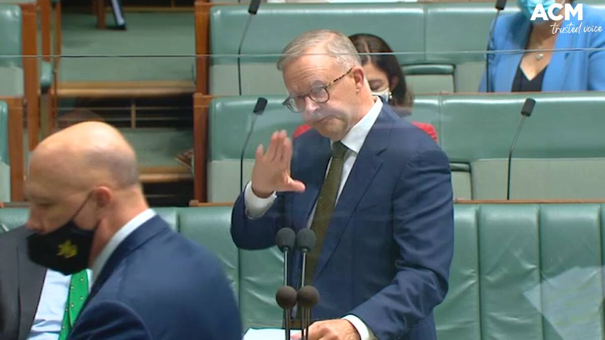 Labor Leader Anthony Albanese (centre) motions to Minister of Defence Peter Dutton (left) to sit down in the House of Representatives on Wednesday, February 17, 2022. Photo: Parliament of Australia.