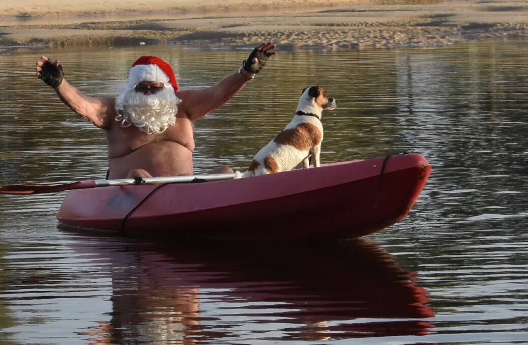 Ron Hunter, the Lake Cathie Santa, and his dog Ruby. Picture by Mardi Borg
