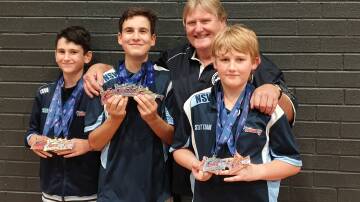 Karate students Jay Iveli, Liam Urbanica and Sam Hilton with instructor Peter Becroft. Photo: supplied